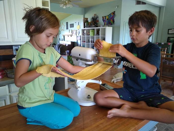 kids helping make pasta