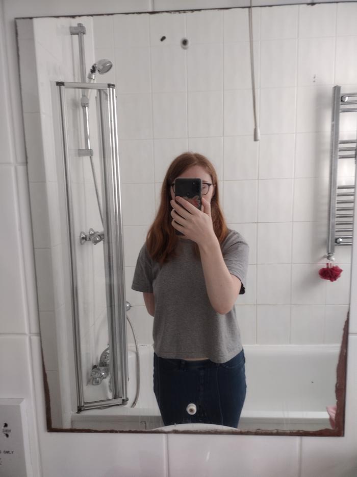 Clean mirror (the black marks are under the glass and have been there since I moved in)