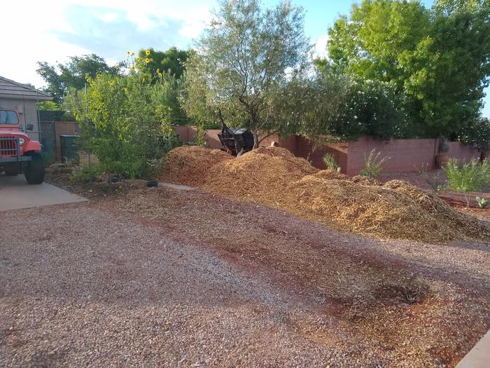 where every delivery of wood chips comes in, a long walk from where most of them go, all by a wheel barrow.