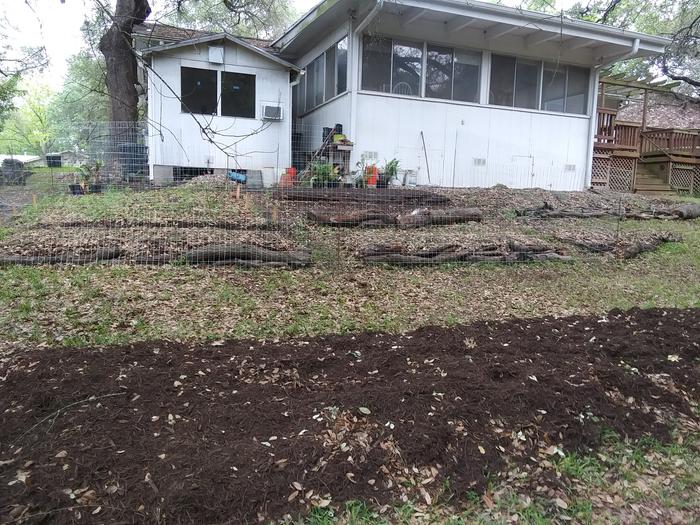 fenced garden on slope