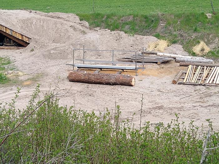 A log at base camp, waiting for the mill to be repaired