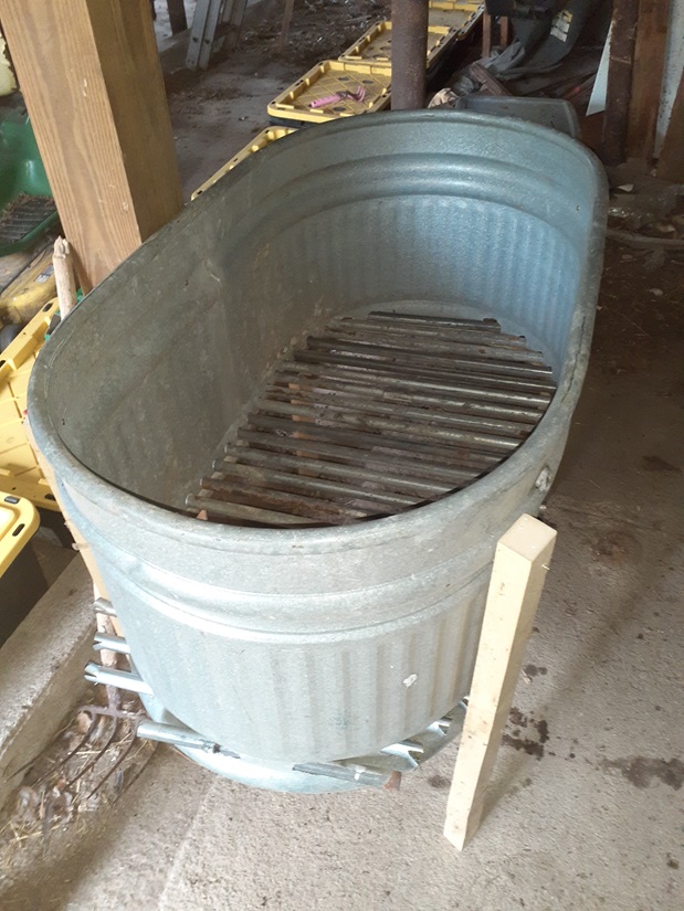 Side view so you can see the conduit folded over and coming out the sides of the bin.