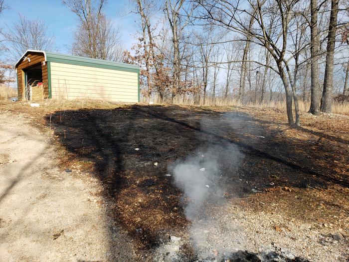 Scorched earth by the goat barn... I got it stopped only about 3feet from the straw around the open door...