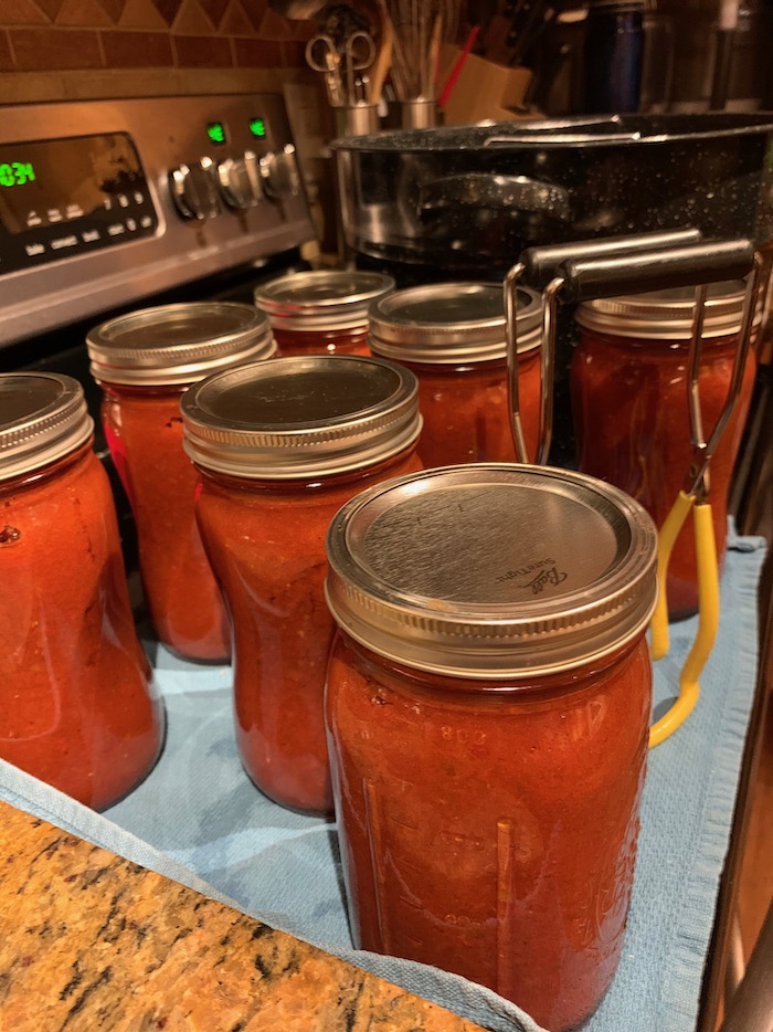 seven quarts of delicious tomato sauce, and no stirring required!