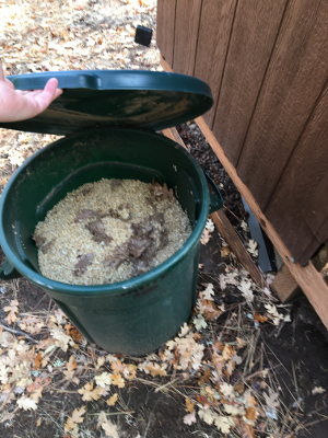 extra sawdust stored in the bins on each side