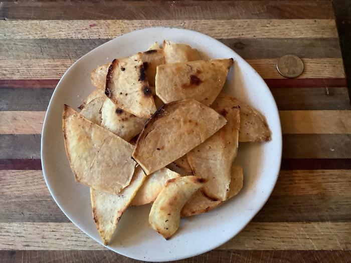 chips apios big ones, parboiled, sliced thin, fried in bacon grease and salted!