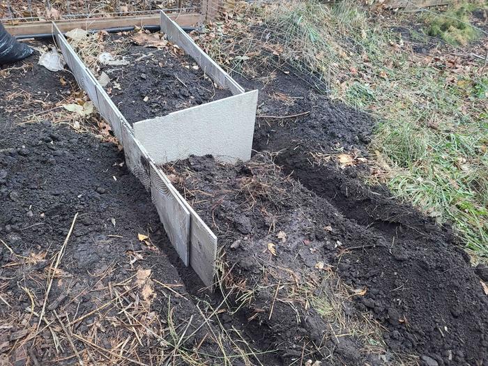 Raised bed from ceramic tiles, in progress of construction