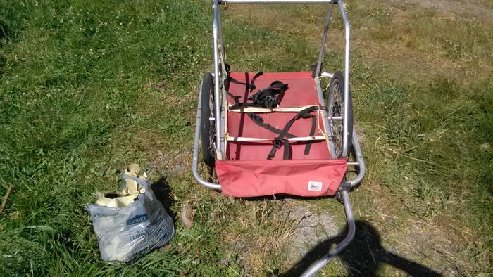 Burly bike trailer in need of repair