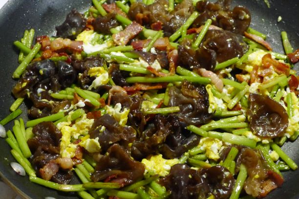 Stir fried with bacon, garlic scapes and eggs