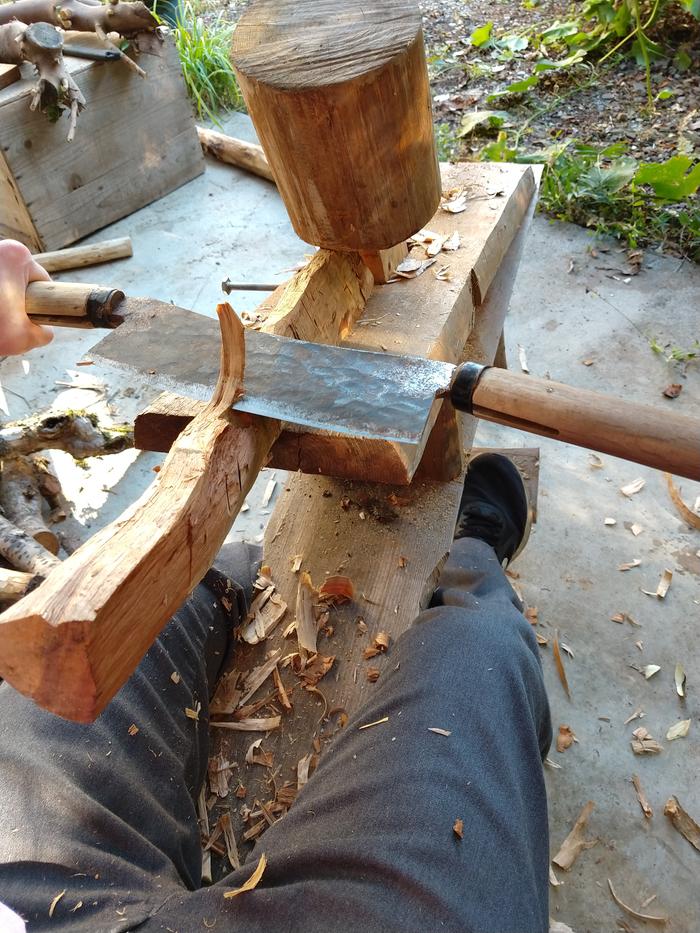 Drawknife for bark removal doing double duty as a carving tool