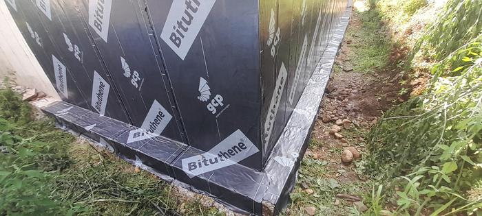 Bituthene sheeting to waterproof the walls of a hobbit house