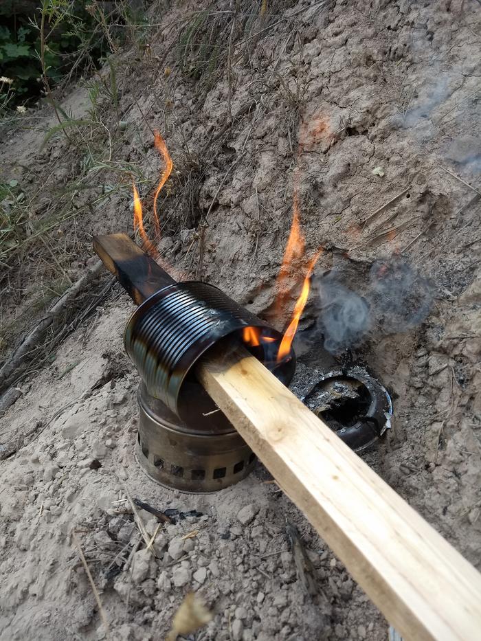 Charring the b-grade boards using a camp stove with a hat