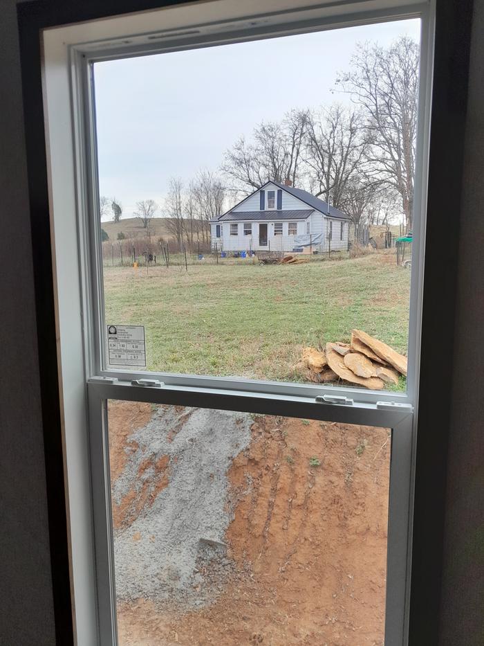 Our house, taken from my brother's new house in our former front yard.