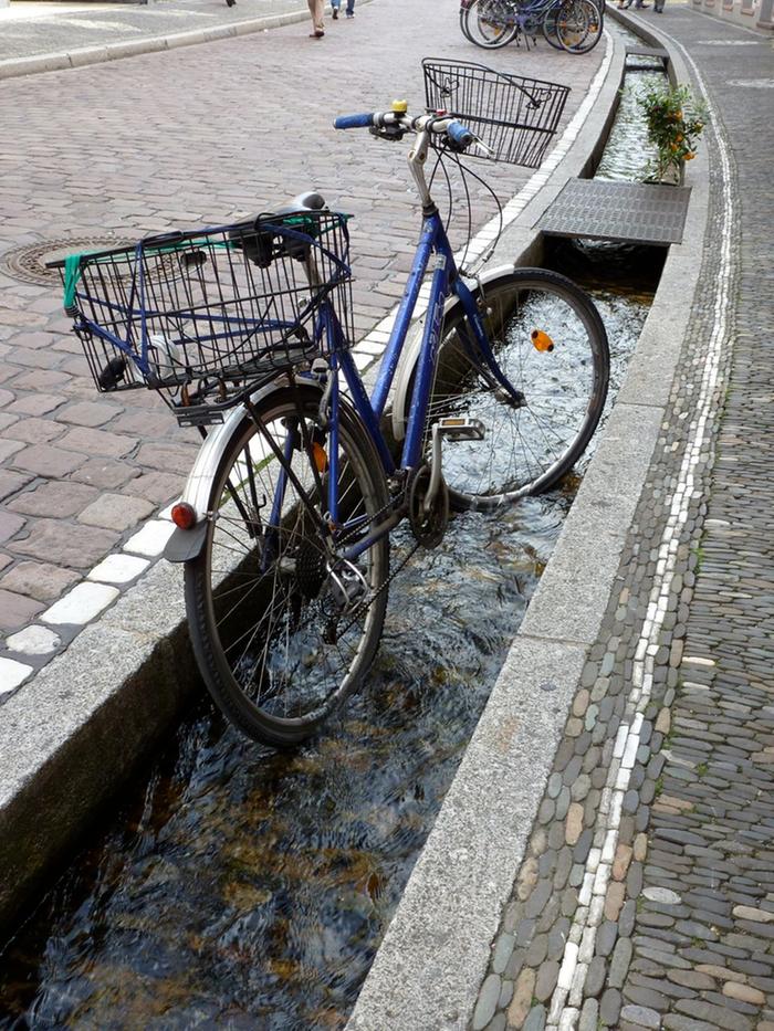 A bicycle in a gutter in Freiburg