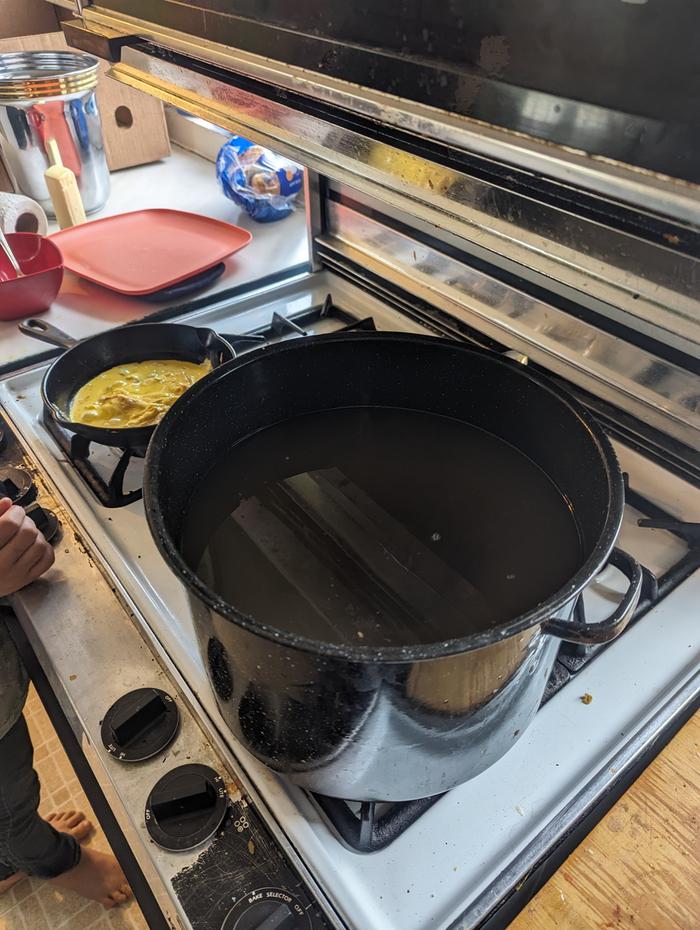 Heating sugar water (with my 7 year old chef making scrambled eggs in cast iron in the background, without sticking to the pan at all).