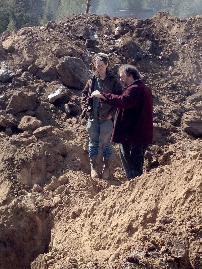 paul wheaton earthworks instructing someone while standing on excavated earth