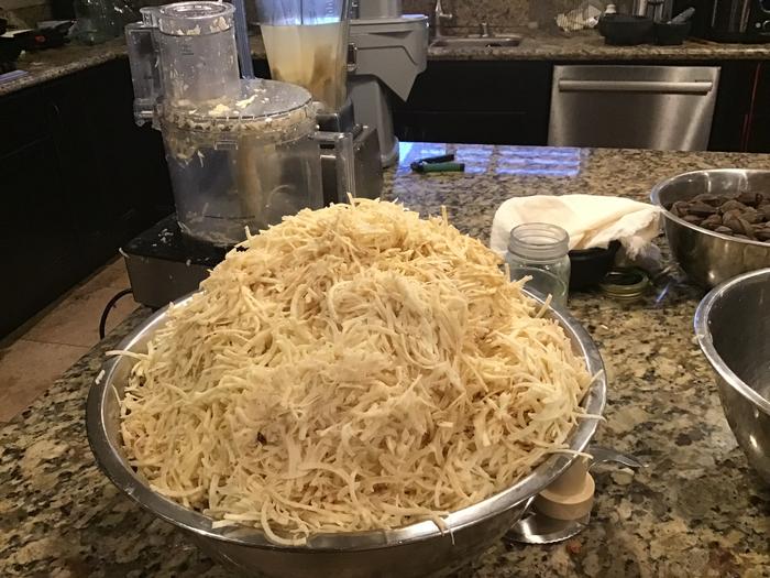 After cleaning and peeling, the sweet potatoes are shredded