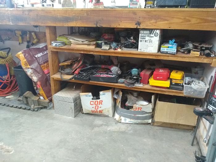 I try to keep the bigger stuff like power tools easy to grab right under the main bench.