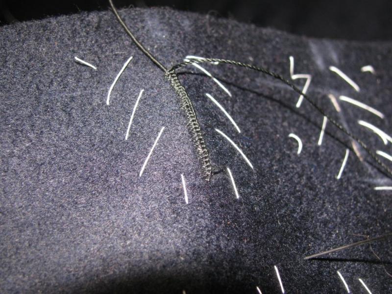 hand sewing buttonhole with natural gimp thread