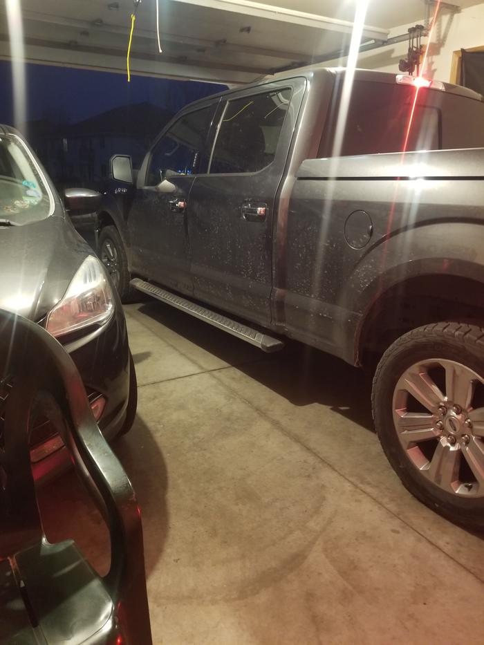 hubs truck in garage/shop, with both vehicles in there's just enough room to get in and out on driver's side and 4' in front of my car (where the bike is)