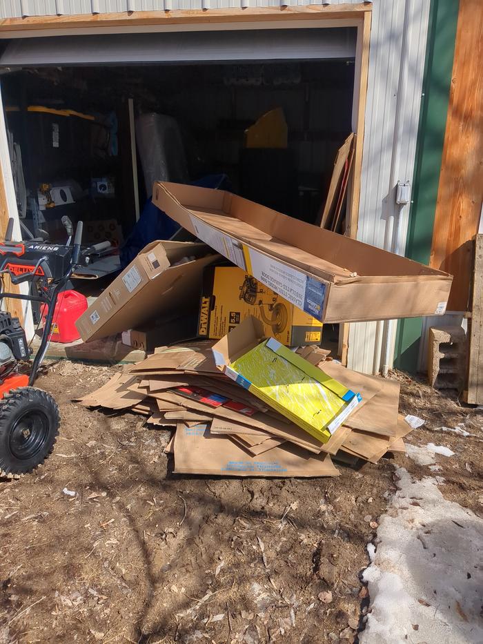 Pulling out cardboard.
