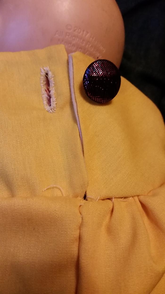 Button sewn on!