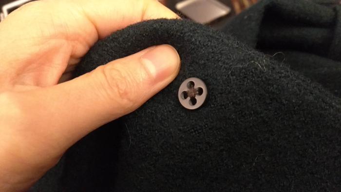 support button on inside of jacket