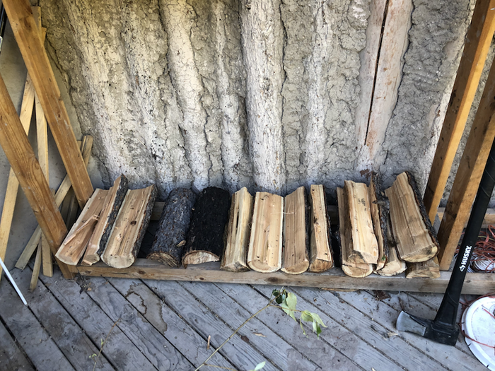 starting the stack (post-split) and it is clear the wood is the correct length, fitting in this firewood rack which is designed to fit pieces 15-16 in length for use in the Allerton Abbey house on Wheaton Labs