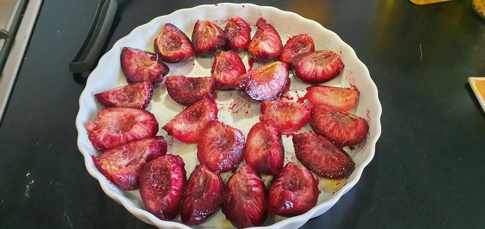 Peaches in well buttered dish