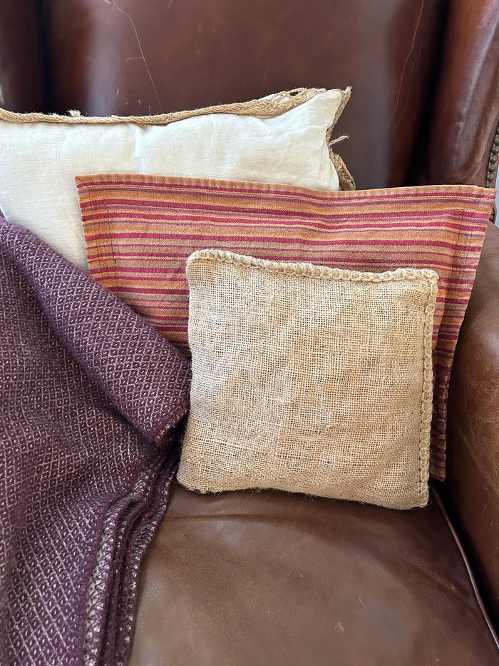 hand crafted pillow on couch