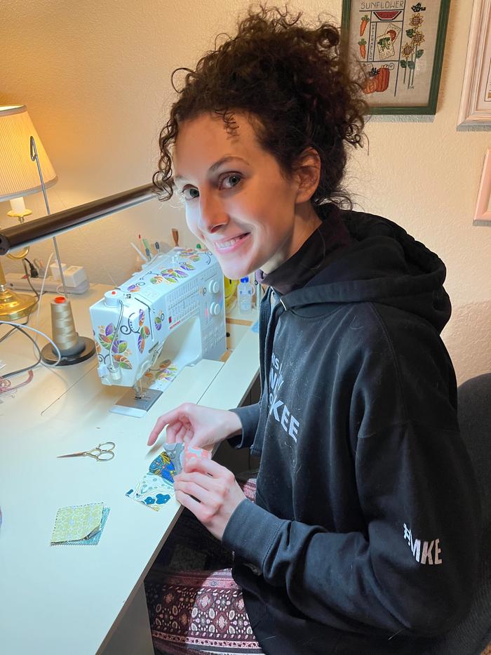 Me at my mom's sewing table. I was lucky to have such nice tools and a space to use!