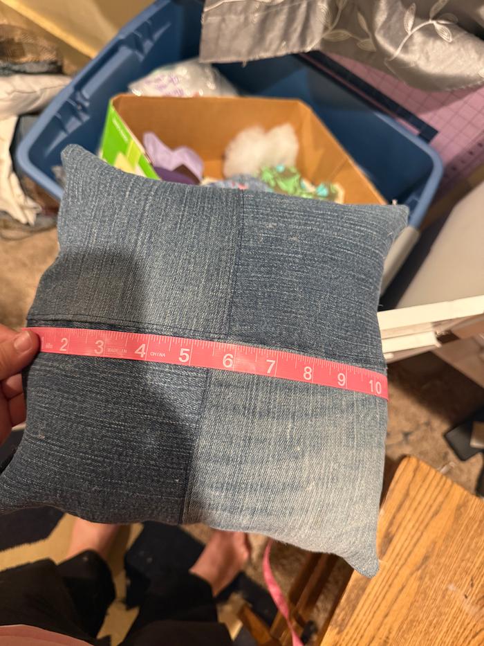 It is a near perfect square. About 10.5x10.5 inches