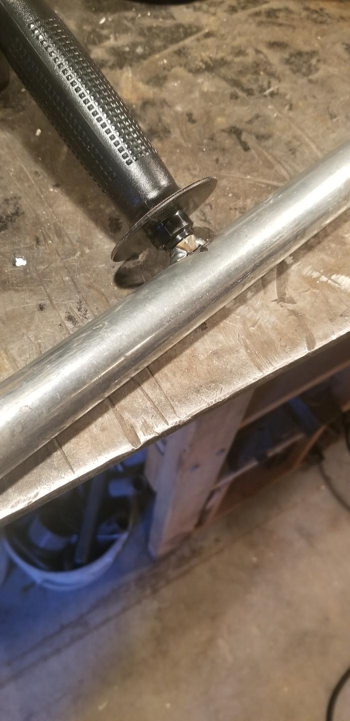 Welded a nut for a grinder handle