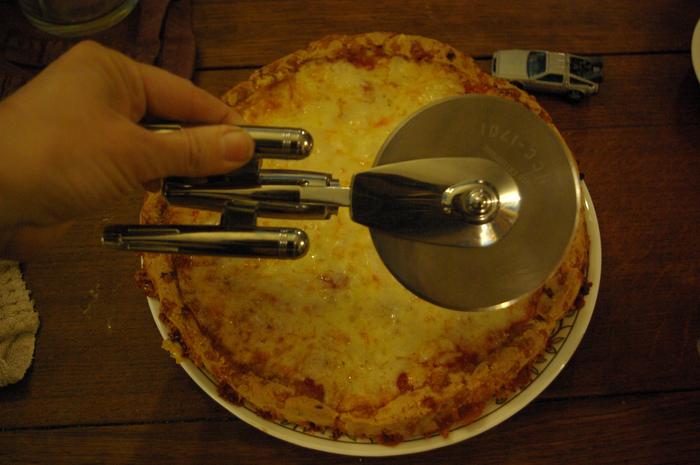 Duuun-dun-dun-dun-dun-dun-dududuuuuuun! (Star Trek music to go with our pizza cutter)