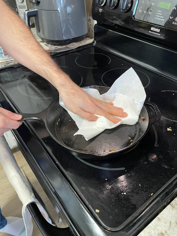 cleaning the pan after cooking