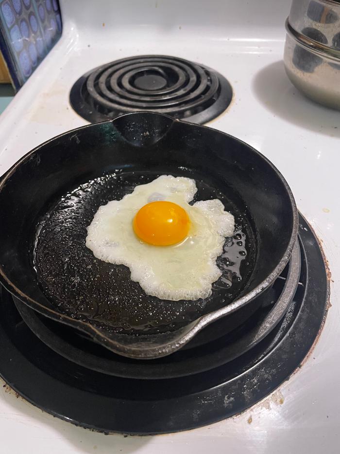 Cracked into hot seasoned cast iron at first smoke 