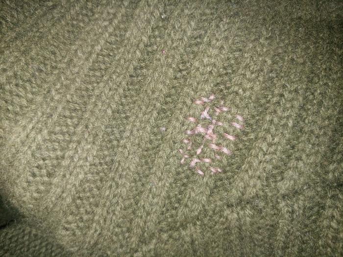 darned hole in sweater