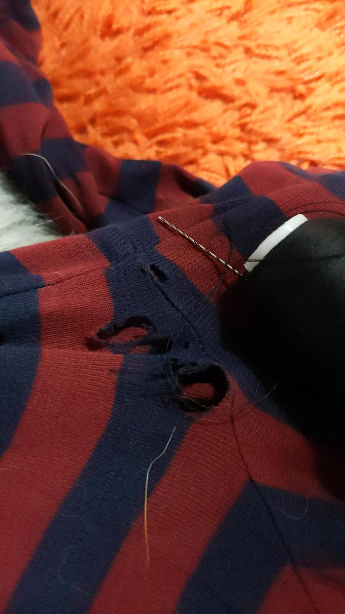 holes in t-shirt needing mending