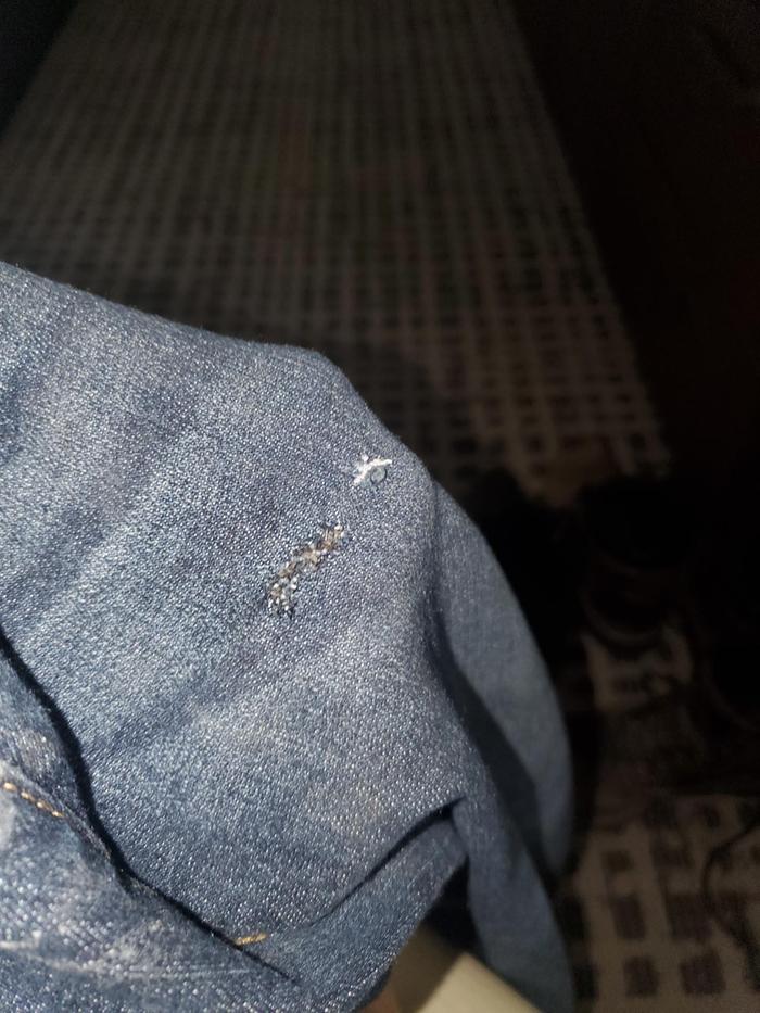 hand mended hole in jeans