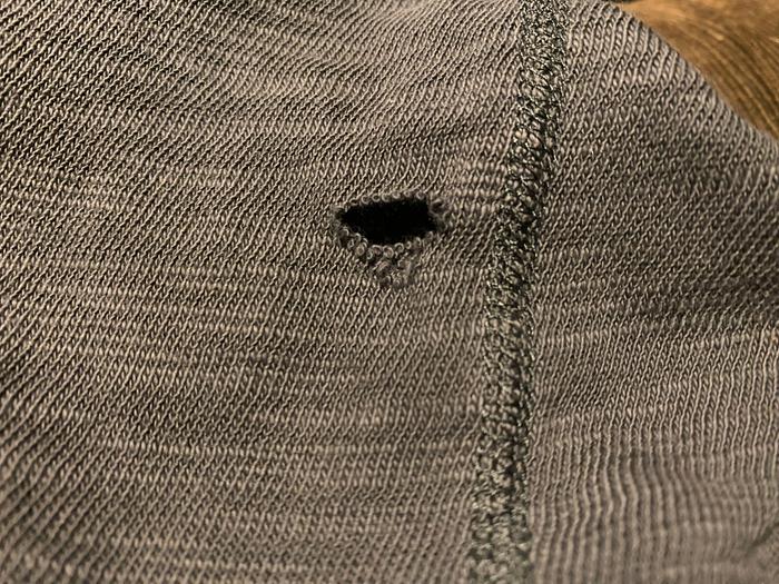 The hole in the shirt