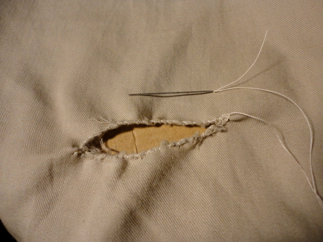 I decided to first stitch around the frayed edges a bit.