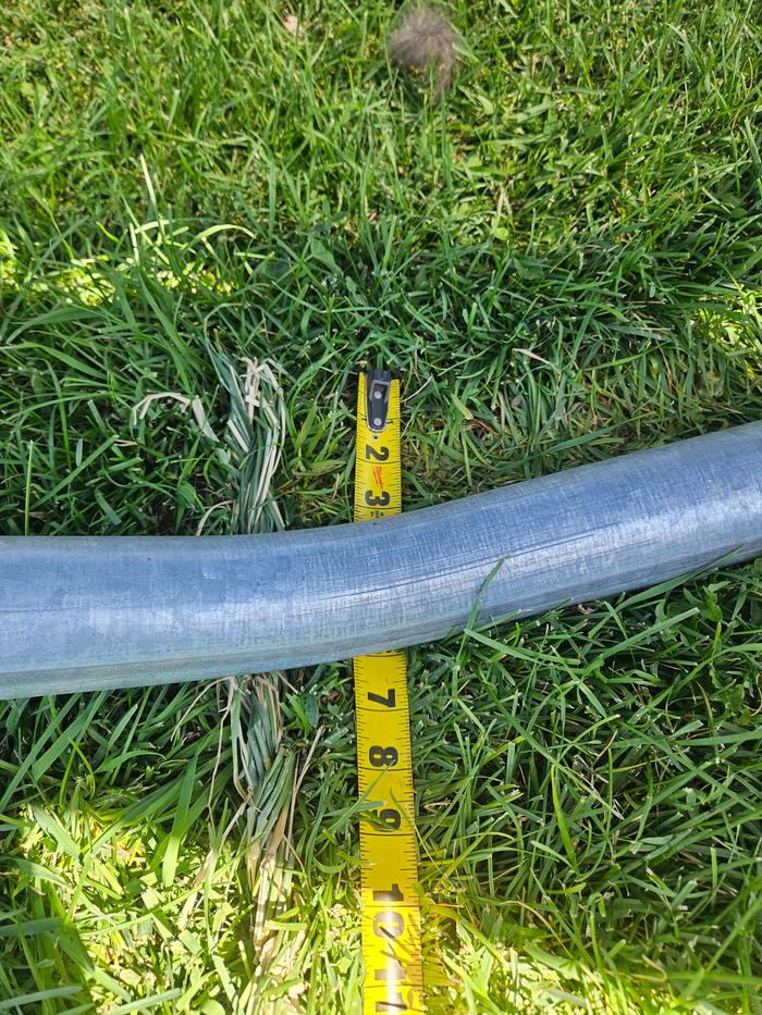 end of cord and tape measure stuck under the trampoline