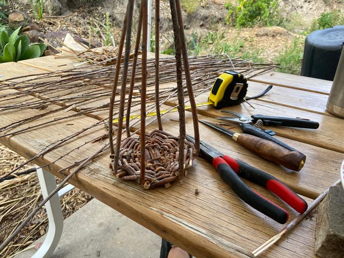 handweaving a willow basket