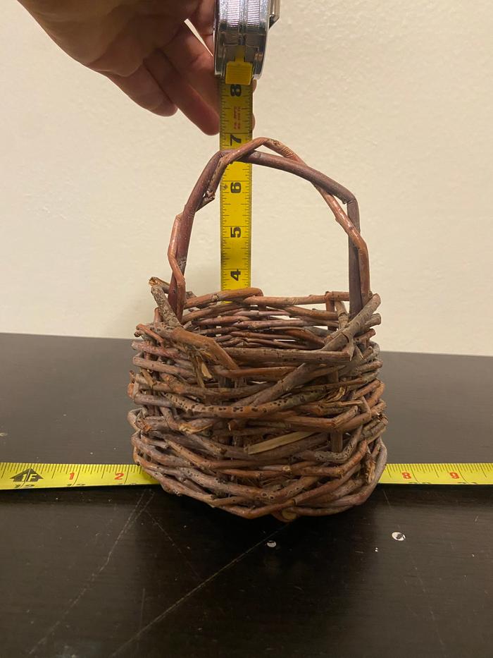 measuring a handwoven willow basket