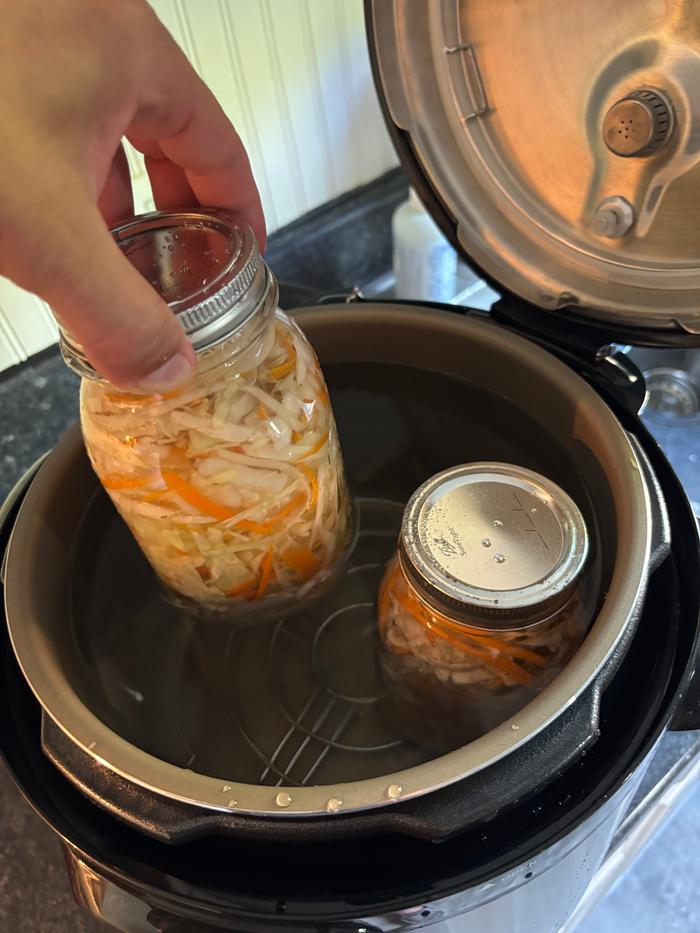 Jars going into the canner