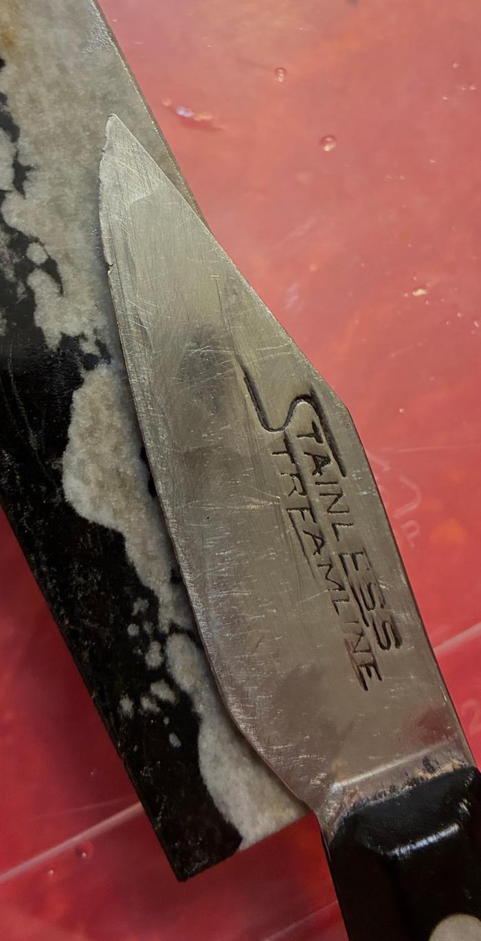 Very dull paring knife with several nicks