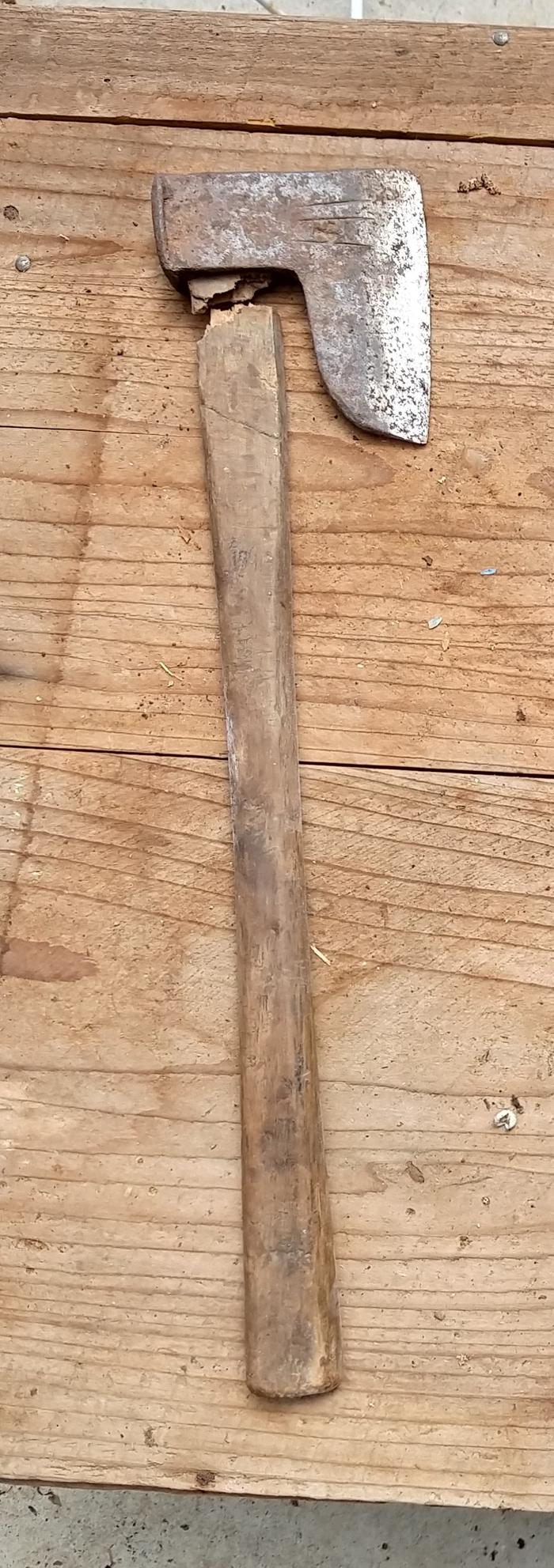 Axe with broken handle