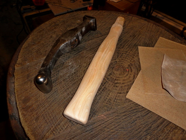 I've now filed and sanded down the handle, making it fit and feel comfortable in my hand.