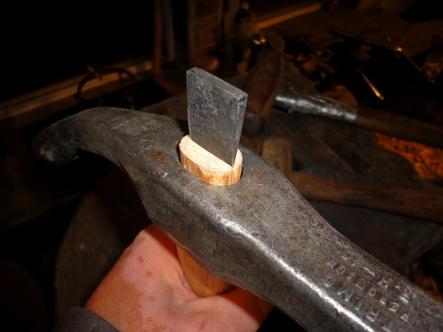 Beginning to hammer it in. Yes, I specifically forged it to be wide enough, but not too wide.