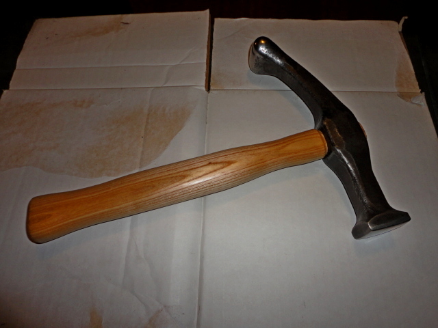 The finished hammer handle mounted and oiled with linseed oil.